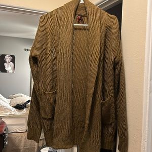 Woman’s brown cardigan